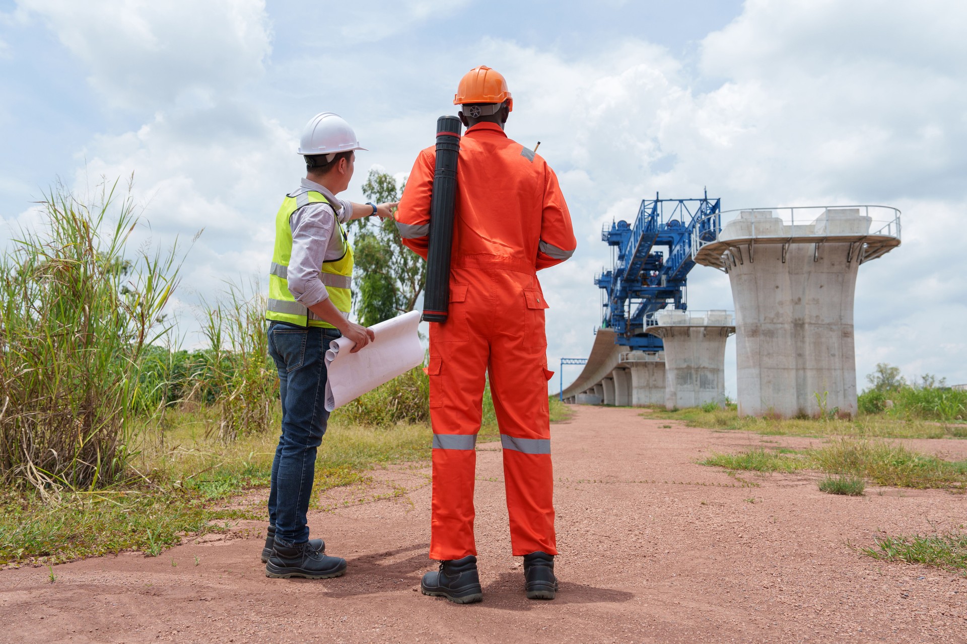 Engineers supervising the construction of high-speed railway bridges and roads